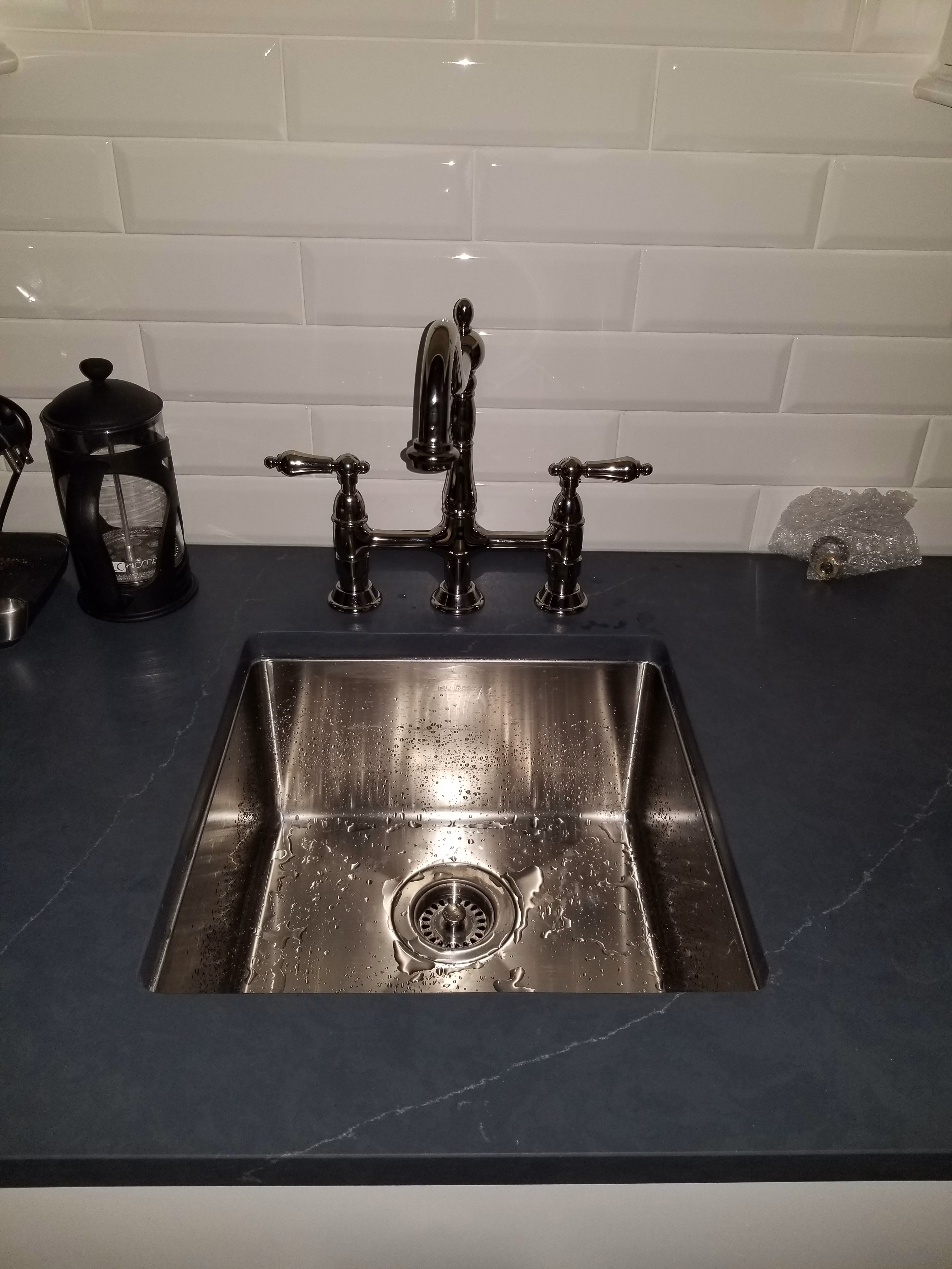 Kitchen faucet installation and leak repair provided by a professional plumber in Lake and McHenry County.